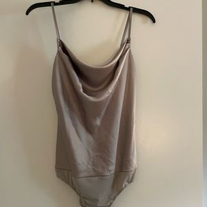 Brand is Dress Forum. Size medium. Champagne color.